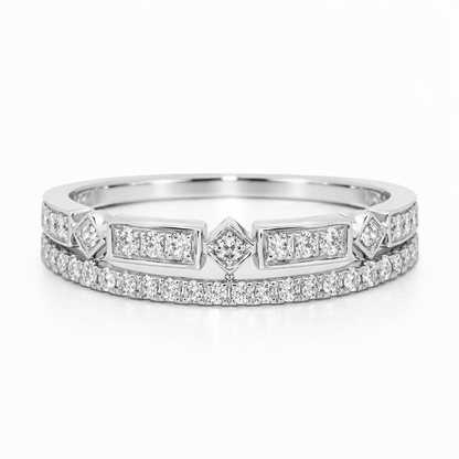 Two diamond rings stacked on a white background