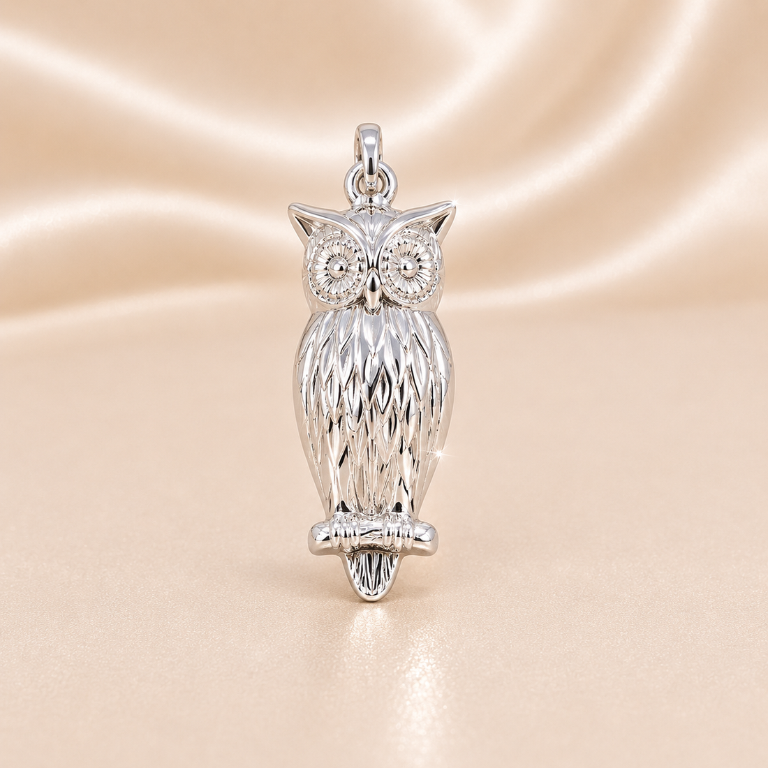 Silver owl pendant on a beige satin background Sterling Silver | Owl Pendant