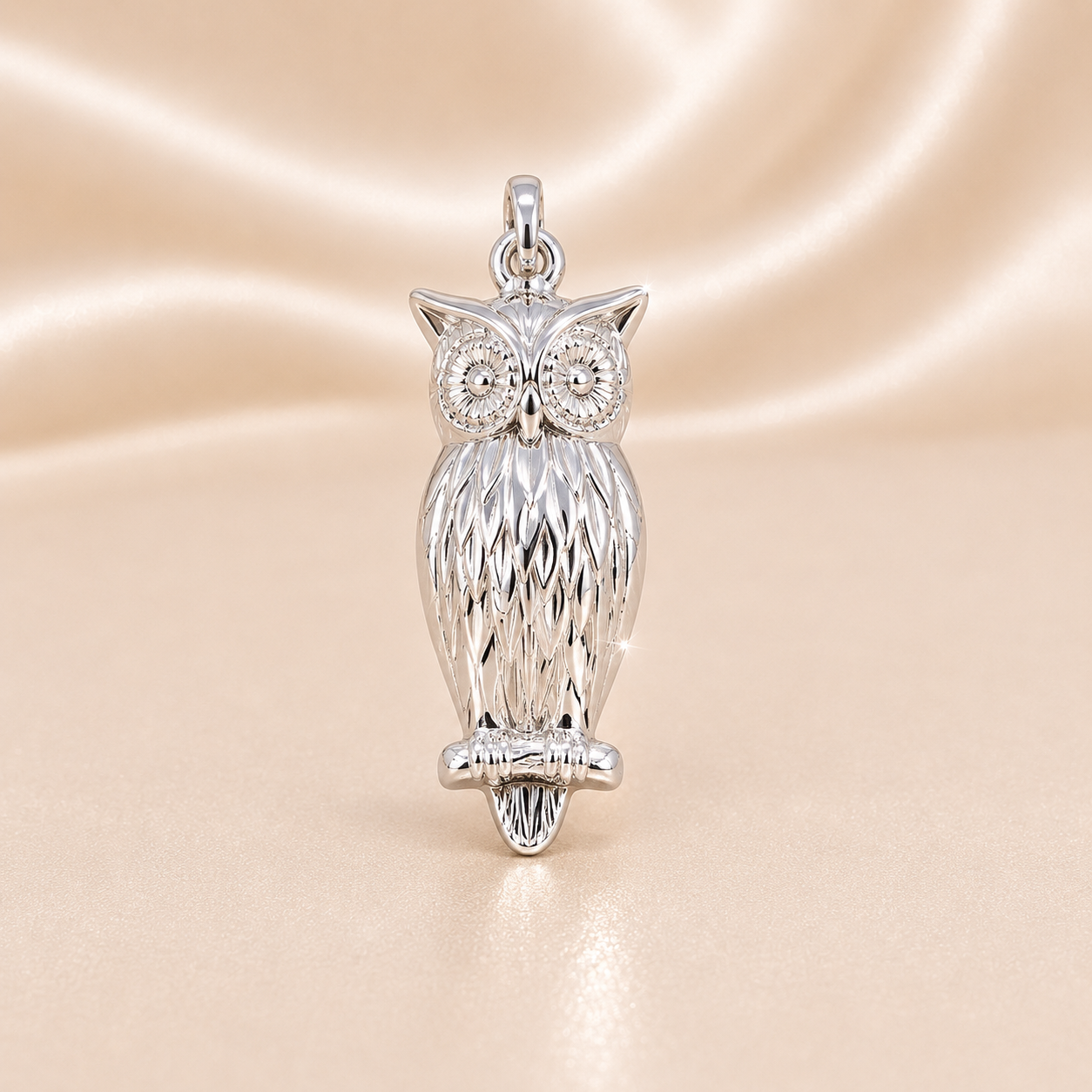 Silver owl pendant on a beige satin background Sterling Silver | Owl Pendant