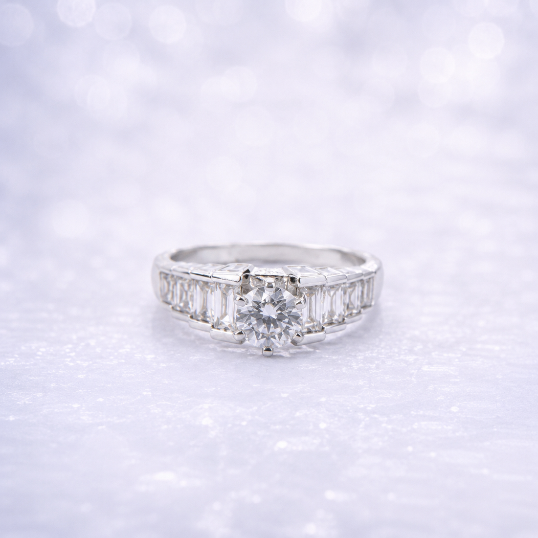 Sterling Silver | Round Solitaire Engagement Ring with Tapered Baguette Cubic Zirconia