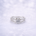 Sterling Silver | Round Solitaire Engagement Ring with Tapered Baguette Cubic Zirconia