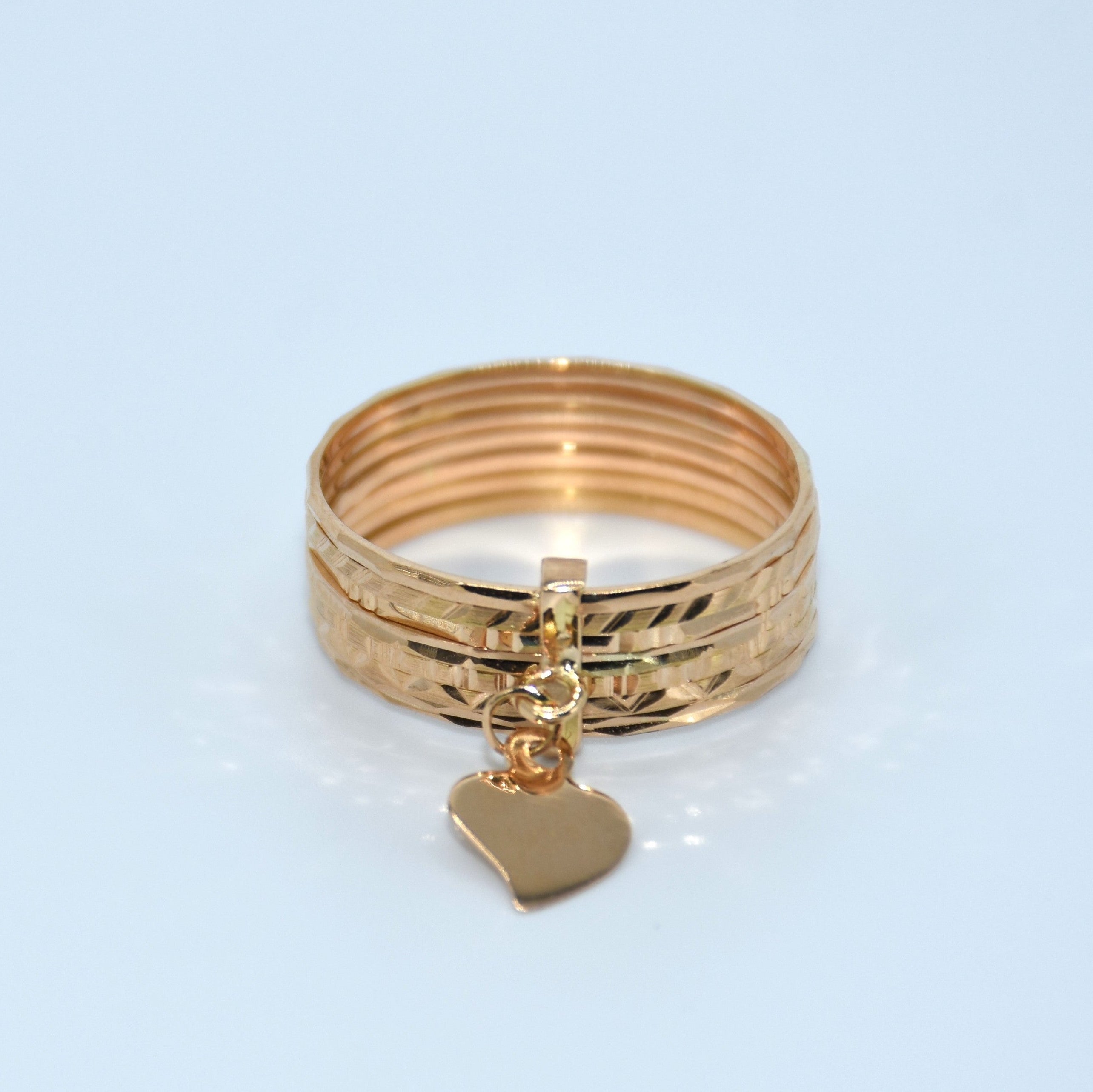 7 band ring Portuguese gold with heart charm
