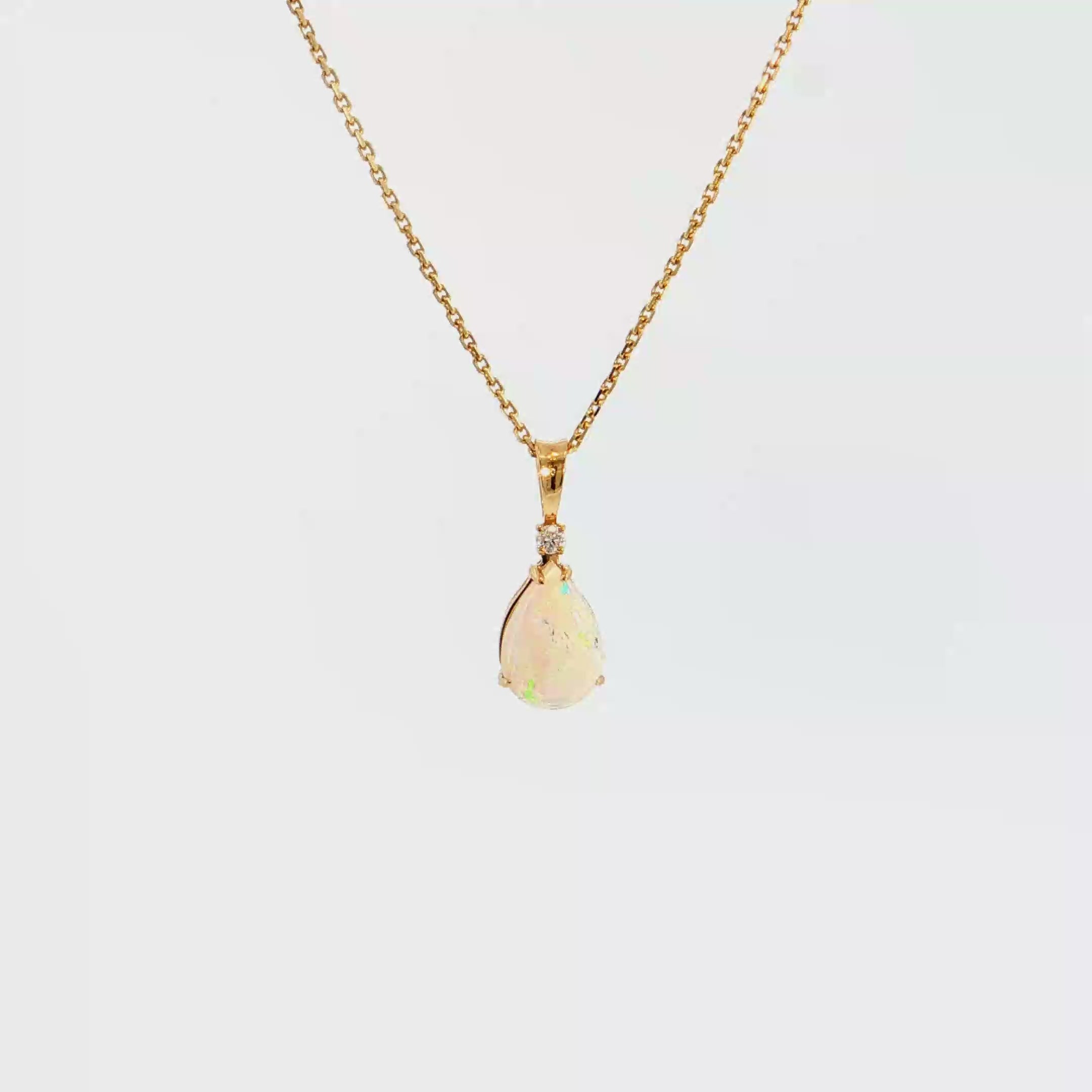 14K Gold | Yellow Gold Pear Shaped 1.05CT Opal Pendant with .03CT Round Natural Diamond
